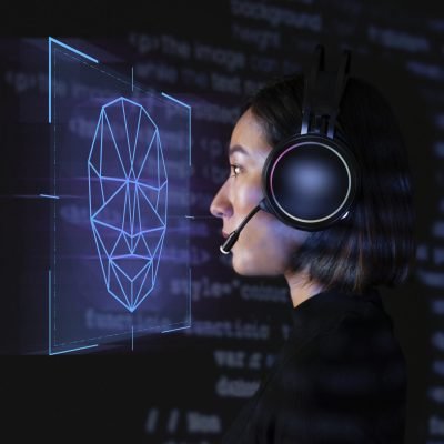 Female programmer scanning her face with biometric security tech Female programmer scanning her face with biometric security technology on virtual screen digital remix